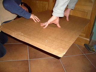 Tracing around the outside shape of the pan